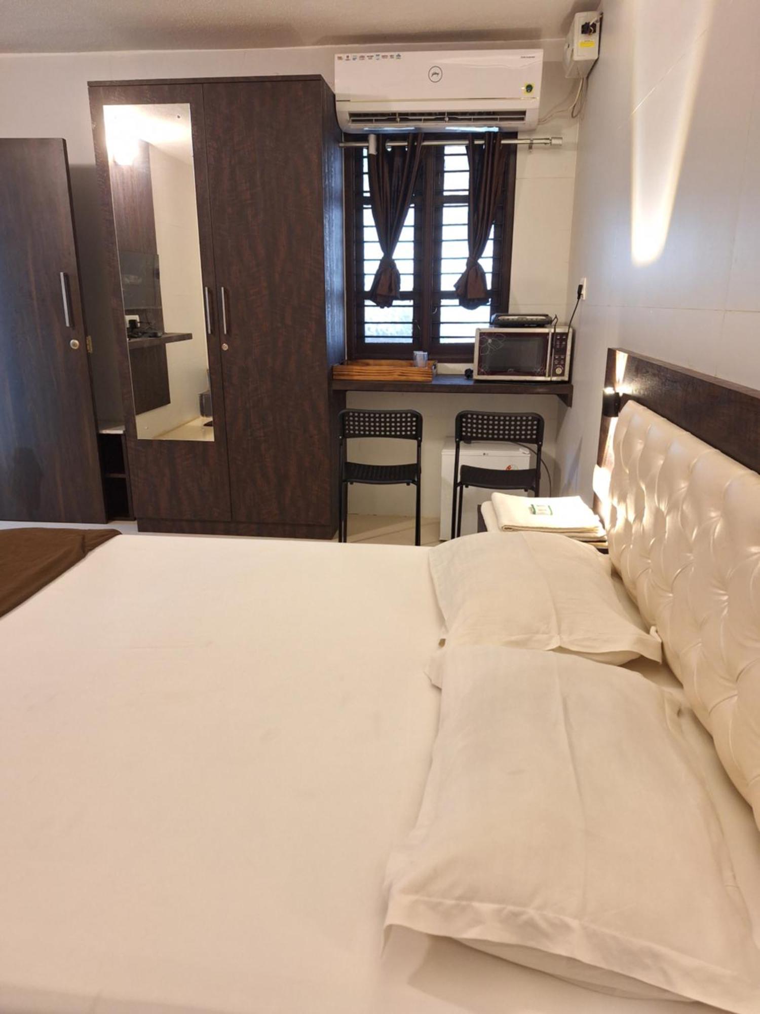 Suvarna Grande Homes Mangalore Room photo